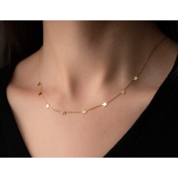 Collier femme étoiles asymétrique en or 9 carats.