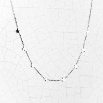 Collier femme étoiles asymétrique en or 9 carats.