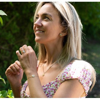 Boucle d'oreille femme arbre de vie 18 carats et diamant de 0,03 carats.