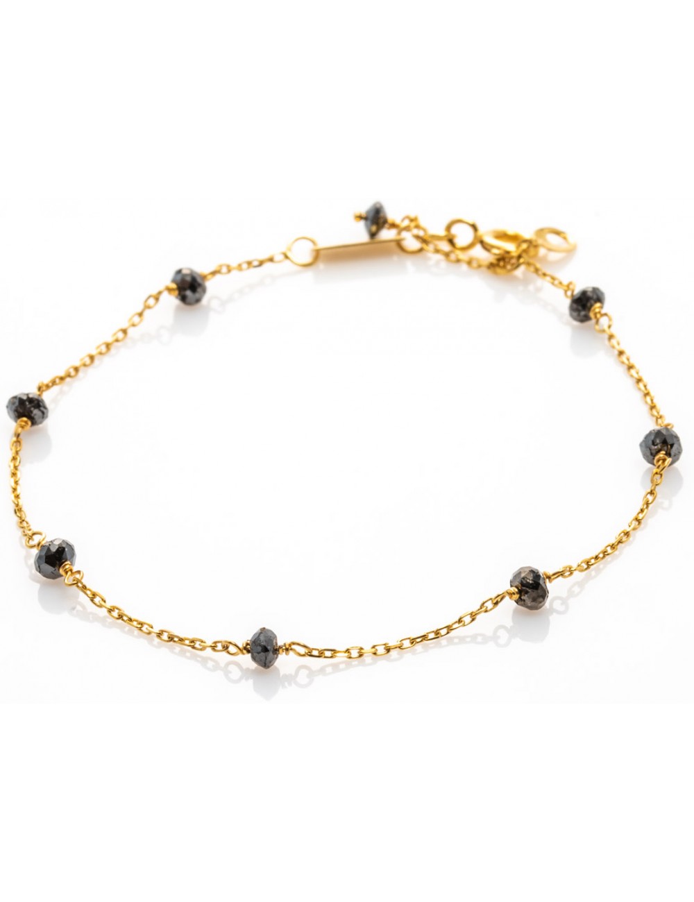 Bracelet en Or Jaune 18 carats composé de 8 diamants noirs. Bracelet en Or Jaune 18 carats composé de 8 diamants noirs.
