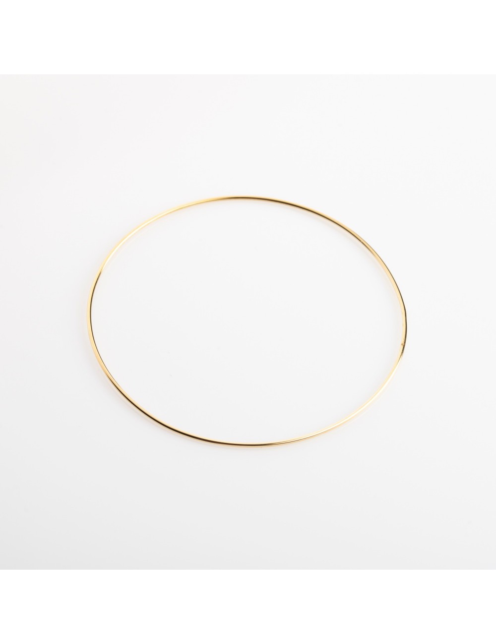 Bracelet fil rond rigide en Or jaune. Bracelet fil rond rigide en Or jaune.