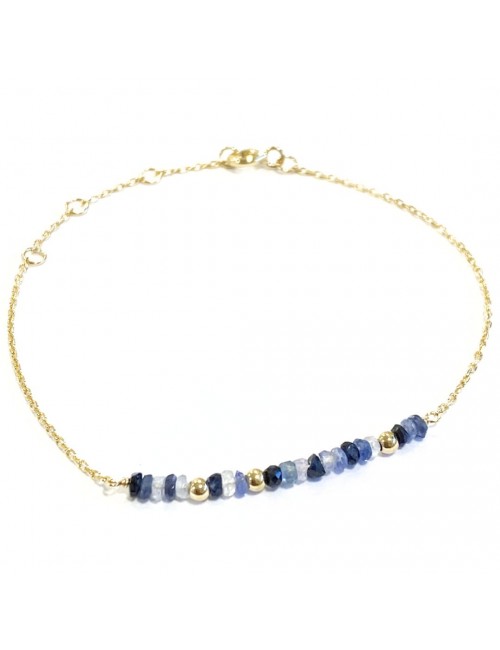Bracelet en Or jaune 18 carats orné de petits Saphirs séparés par des boules d'Or.