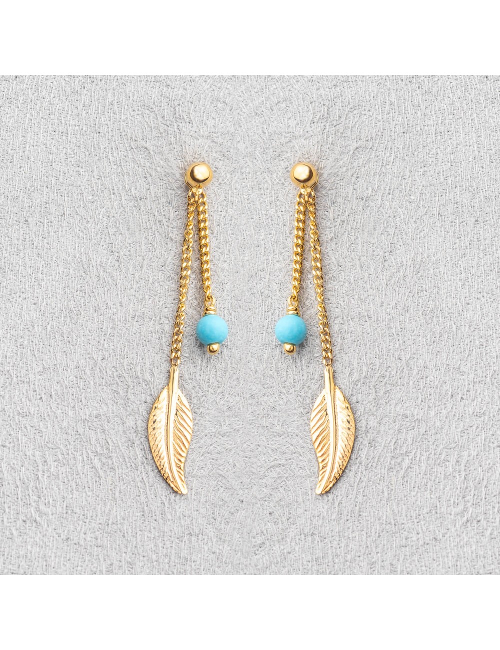 Boucle femme plume et turquoise.