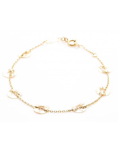 Bracelet rond froissé et ajouré en or 9 carats.