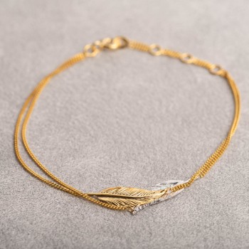 Bracelet double plume or jaune et blanc 9 carats.