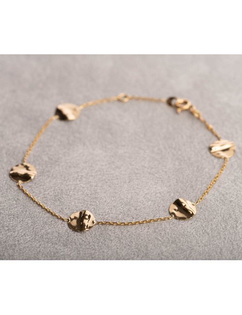 Bracelet femme orné de cinq ronds froissés en or 9 carats.